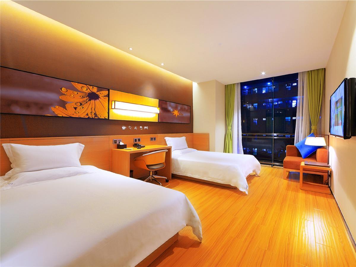 Iu Hotel Ruoyang Yiyang Wenhua Road Exteriör bild